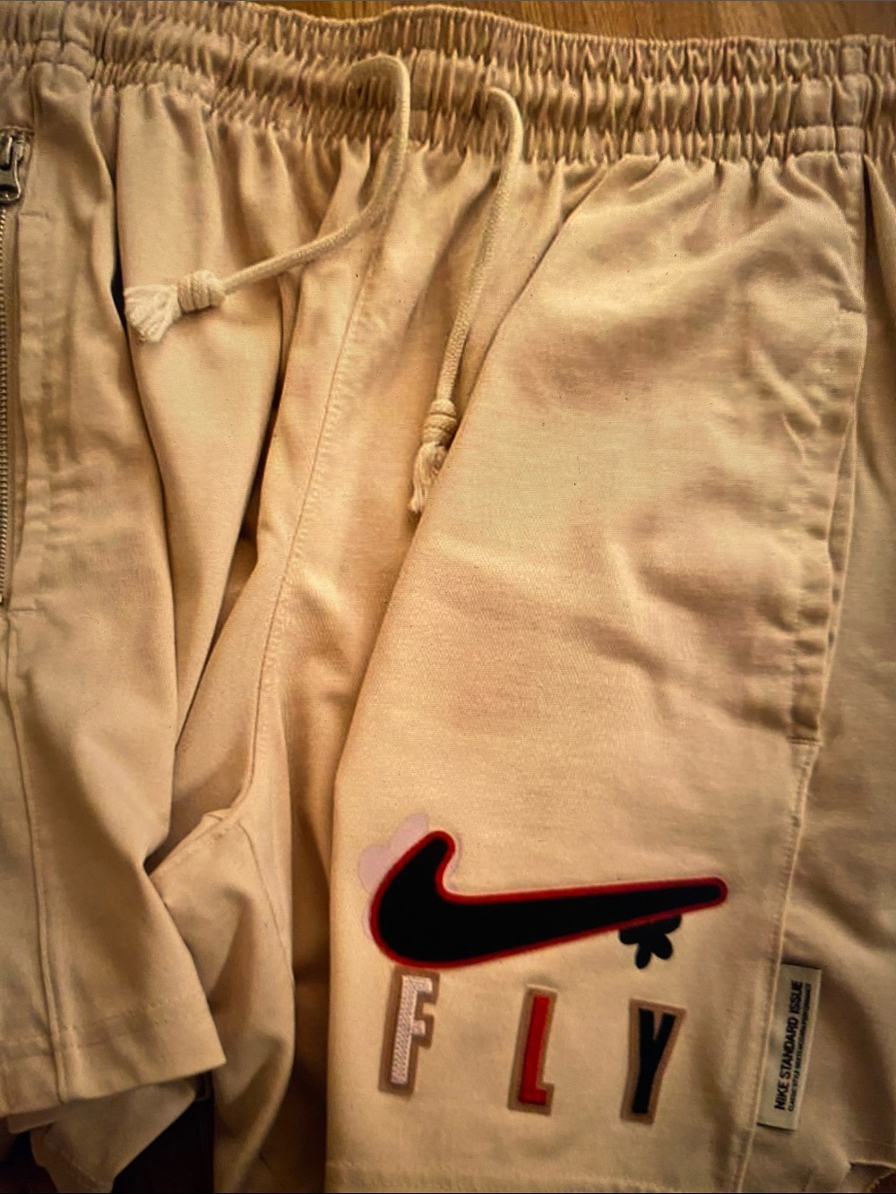 Nike Kids Beige Sweatpants with Black & Red Swoosh